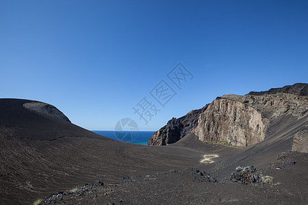 火山岩和海洋海滩沿海岩石海岸蓝色悬崖海岸线火山旅游风景图片