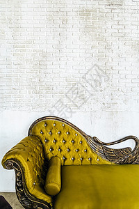 在砖墙背景的古色古香的沙发石头复古装饰建筑家居家具皮革古董建筑学扶手椅图片