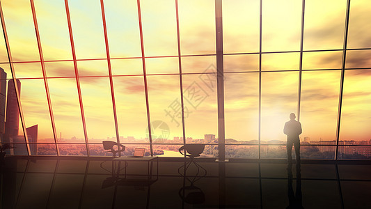 办公室的商务人士 在日落时市风景的背景之下工作图片