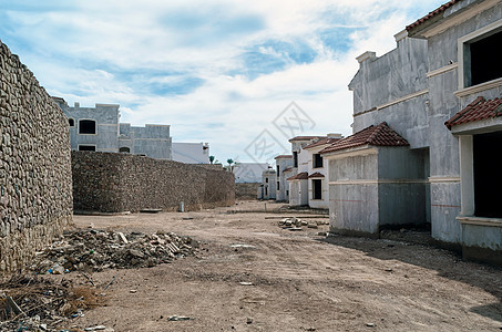 在埃及没有人的街上被遗弃的旅馆里旅游假期异国白色贫民窟贫困蓝色城市旅行石头图片