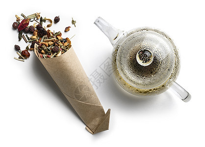 含有天然芳香添加剂和茶壶的绿色茶叶 白背景最佳视图白色黑色产品香气仪式植物早餐叶子饮料芳香图片