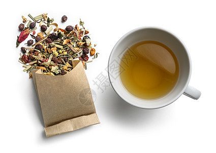 绿色茶 含有天然芳香添加剂和一杯茶 白色背景的顶端视图饮料仪式草本植物黑色香气植物早餐杯子产品叶子图片