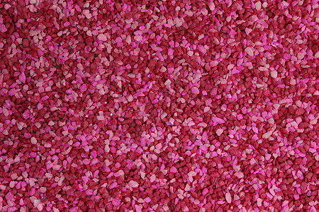 粉色装饰颗粒石头粉红色材料背景背景图片