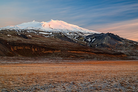 日落 冰岛水平旅行火山石头地标天空半岛顶峰风景冰川图片