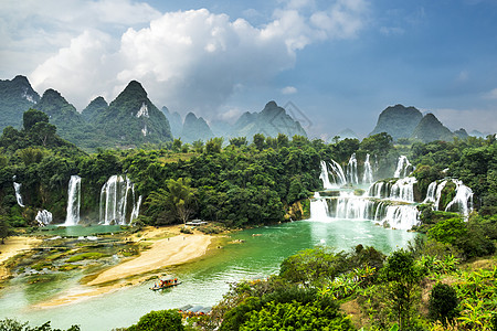 德提安瀑布山脉多云岩溶天空瀑布图片