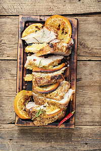 橘子烤肉油炸水果炙烤橙汁食物猪肉桌子香料迷迭香背景图片