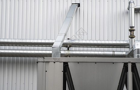 墙上空调和通风系统的通风管道 在墙上安装气管面包建筑力量空气天空植物技术工厂风管房子图片