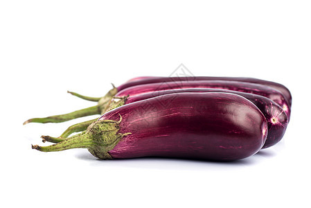 在白色背景上隔离的茄子种植 黄瓜或蔬菜饮食甜瓜条纹美食紫色营养绿色工作室食物水果图片