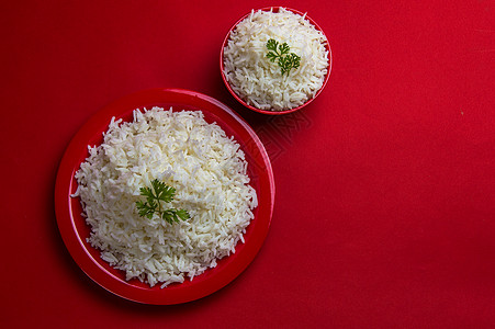 用碗盘和红底盘煮白纯白巴斯马蒂米饭营养糖类香菜文化种子食物餐厅纤维粮食香米图片