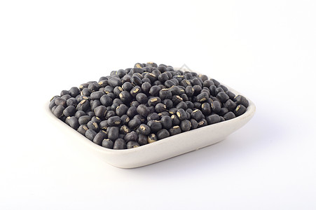 Urad dal 黑克 白色背景白盘中的农场蔬菜食物植物扁豆种子生活哑光收成宏观图片