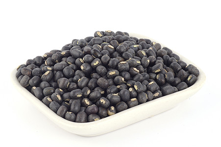 Urad dal 黑克 白色背景白盘中的蔬菜收成病菌种子食物生活扁豆谷物宏观生长图片