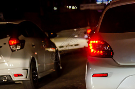 夜里堵塞交通休息红灯运动速度运输城市驾驶街道红色旅行图片