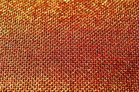 带金色闪光的红色黄麻纺织品金子红黄麻亮片背景背景图片
