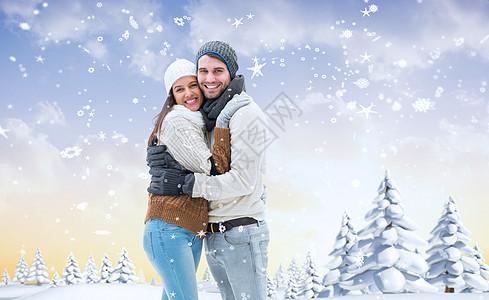 年轻冬季夫妇的复合形象帽子寒意枞树计算机夫妻感情树木下雪绘图森林图片
