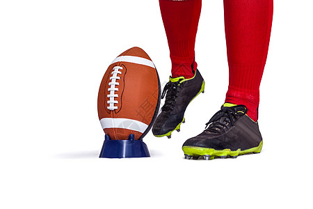 美国足球运动员 即将踢球的美国球员服装竞赛运动服运动动员视图袜子橄榄球竞技红色图片