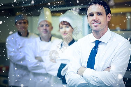 积雪降雪的复合图像快乐同事职业微笑经理下雪女性团队商业男性图片