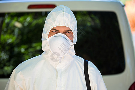 害虫防治员的近距离检查男性预防安全安全帽服务控制除害虫面具防护防护服图片