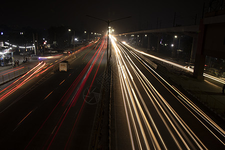 高速公路 长期接触 城市背景和黑暗天空上的高速交通灯光通道速度轻轨旅游车辆延时街道美化技术行人旅行图片