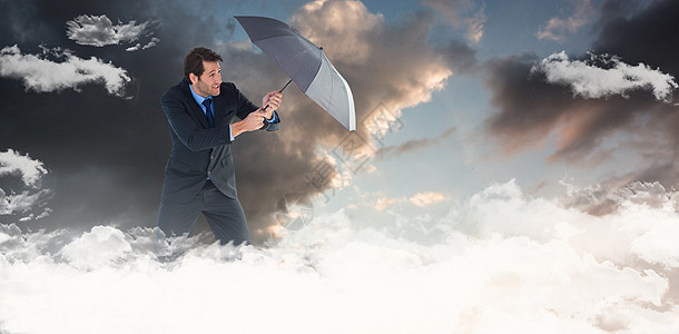 人类用伞保护自己免受雨雨雨的复合形象 在领带人士夹克男人套装天空公司黑色日出衬衫图片