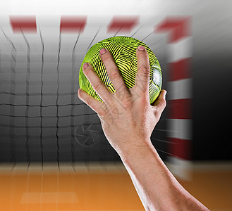 体育运动员握着球的复合形象男人男性竞赛辉光力量运动手球活力游戏竞技图片