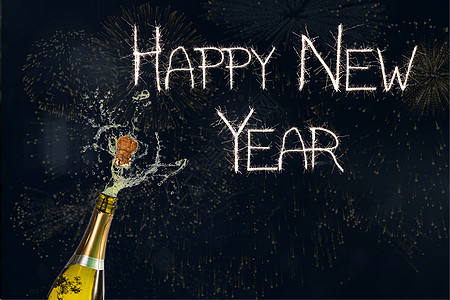 黑色背景的新年贺词和香槟新年图片