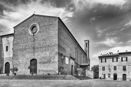 意大利托斯卡纳圣金尼那诺圣阿戈斯蒂诺教堂城市天空旅行建筑石头正方形地标建筑学旅游古董图片