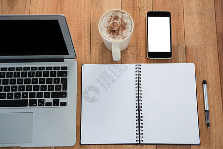咖啡 装有组织者 笔记本电脑和移动电话图片
