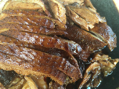 烤鸭和炖鸭小菜食物早餐香料烹饪炙烤鸭肉午餐美食盘子图片