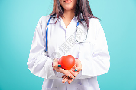 肖像的亚洲美丽的女医生 微笑着与她站在一起心脏病成人药品长袍女性女孩卫生护士保健疾病图片