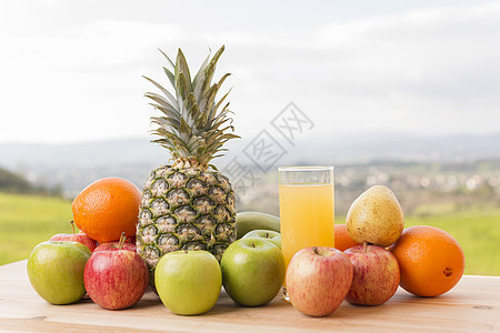 橙汁桌子果汁水果蔬菜菠萝营养饮食季节玻璃叶子图片