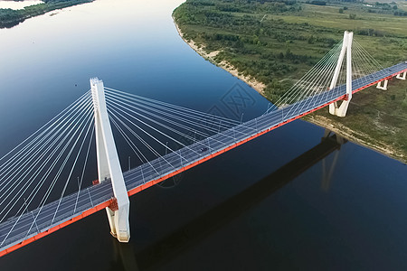 河上美丽的桥 电缆上的桥是罗阿的行人日落海岸场景地标索道天线道路城市天空图片