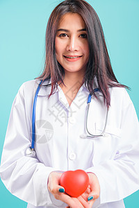 肖像的亚洲美丽的女医生 微笑着与她站在一起女性成人蓝色诊断保健药品医师心脏病学专家医院图片