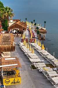 土耳其库萨达西女子海滩支撑火鸡太阳餐厅社论日光长廊蓝色旅游旅行图片