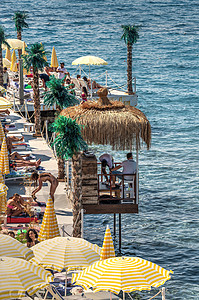 土耳其库萨达西女子海滩建筑物社论支撑太阳餐厅休息室长廊旅行日光蓝色图片