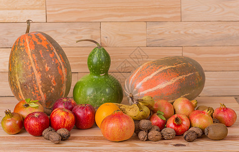 秋季水果季节性饮食团体栗子植物木头叶子南瓜坚果石榴图片