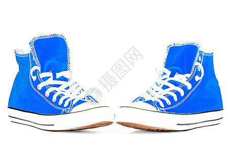 在白色背景上隔离的运动鞋对等运动青少年衣服蓝色蕾丝鞋带运动装服装鞋类图片
