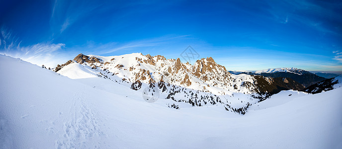 寒冬日落时 席乌卡斯山的全景最高峰踪迹树木远足者风景高山吸引力顶峰天空环境岩石图片