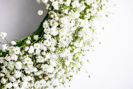 母亲节花环Gypsophila 惊慌的鲜花在新娘概念中花店植物群花束庆典周年女孩婚礼展示花冠纪念日背景