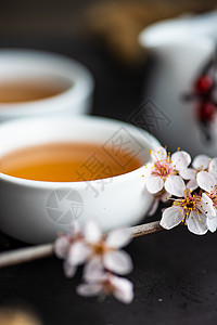 亚洲风格的绿色茶叶概念季节性水泥餐具美丽杯子绿茶乡村水果植物群饮料图片