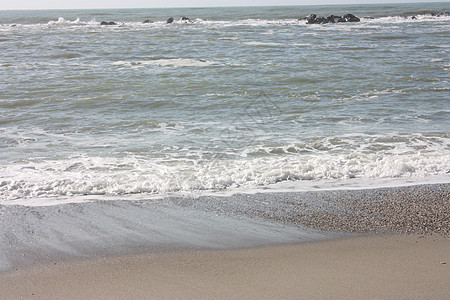 冬季海滩 在维西连里维埃拉有寒冷和枯燥的海浪旅游支撑海岸海洋风暴季节蓝色环境波浪海景图片