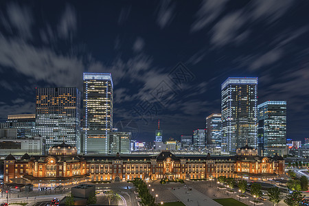 东京火车站Marunouchi一侧夜景全景穹顶曲目干线阴影太阳蓝天铁路火车商业皇宫图片