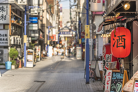 红米纸 有日本袋式干菜的火灯火车站餐厅购物街广告牌零售胡同文字店铺街道酒精图片