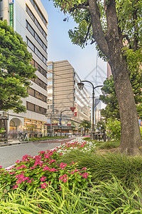 东京Ikebukuro东出口的阳光街摩天大楼情歌商业人行道城市树木建筑景观购物城市生活图片