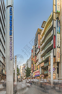 连接Ikebukuro车站东出口的阳光60街树木商业经济广告城市省会地点城市生活人行道乙女背景图片