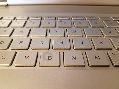 计算机上带字母的金属银金金金键盘钥匙电脑笔记本技术灰色图片