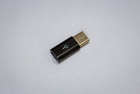 USB 微缩到 C 类型 USB 小适配器适配器白色硬件塑料电脑黑色界面连接器电子宏观图片