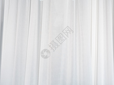 白色窗帘由平纹细布制成 阳光柔和图片