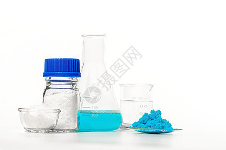 白色实验室桌上的无机化学品医院化学烧杯流感药店蓝色玻璃药品氨基实验图片