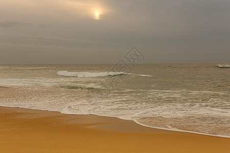 海滩海景首脑海洋日落海浪海岸支撑孤独岩石假期图片