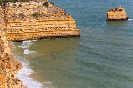 普拉亚达马里尼亚石头海岸线海洋旅行蓝色全景太阳浮潜支撑呼吸管图片